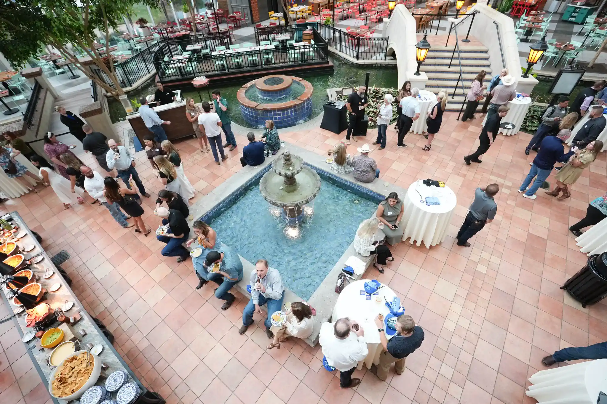 Corporate reception at the Gaylord Texan atrium during the Veterans United Realty annual event.