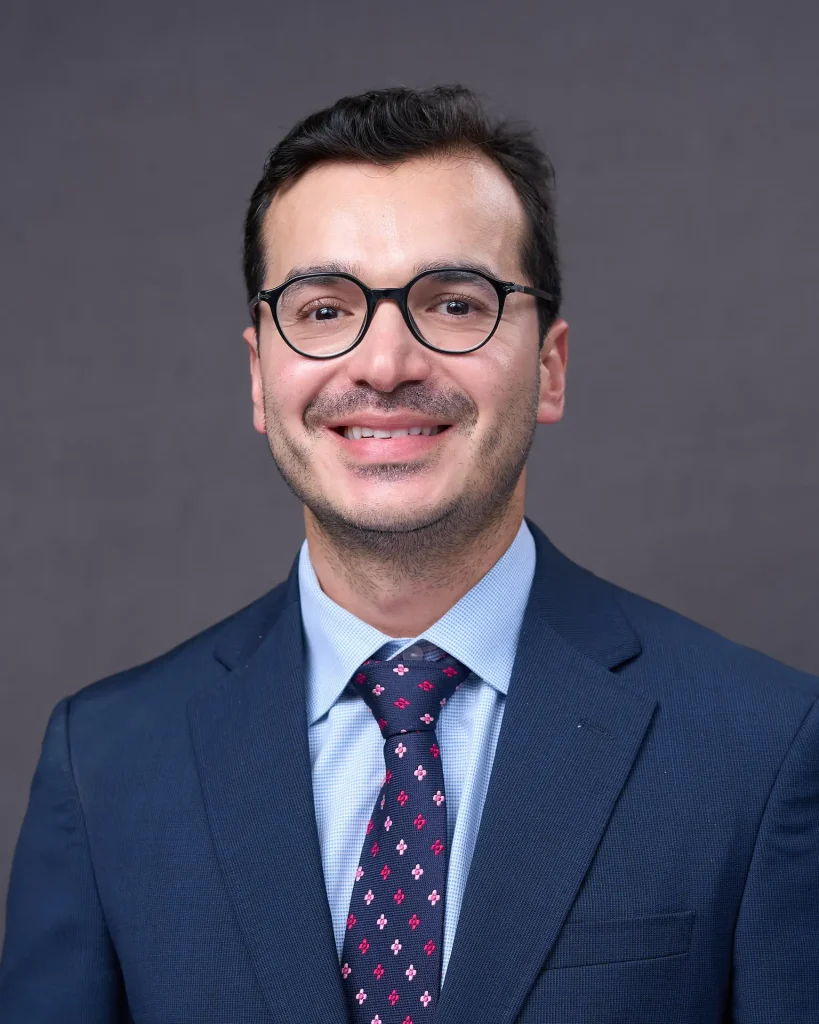 Professional onsite corporate headshot on a studio background