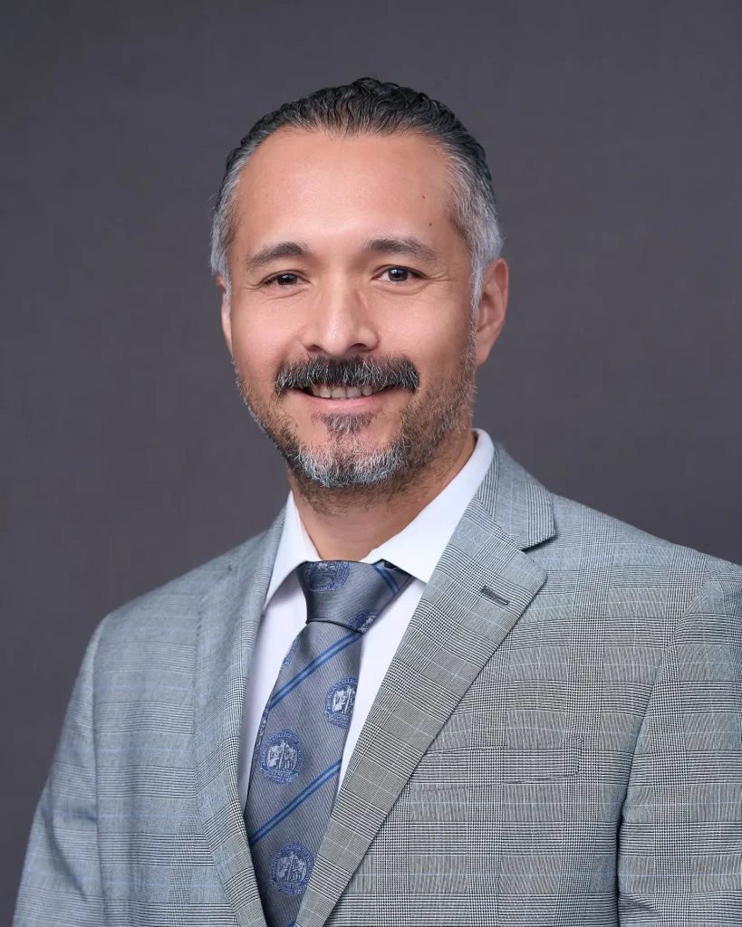 Professional onsite corporate headshot on a studio background