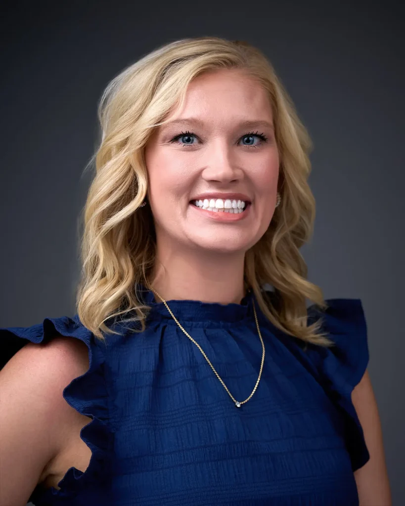 Professional onsite corporate headshot on a studio background