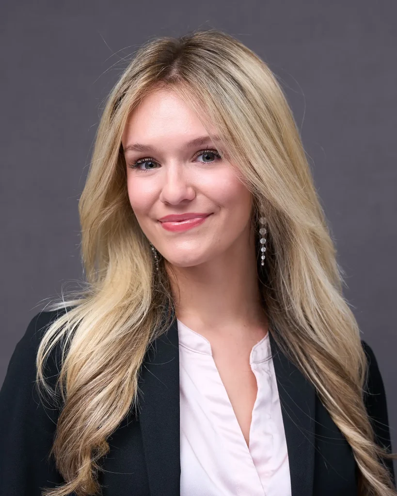Professional onsite corporate headshot on a studio background