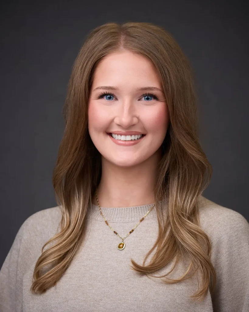 Professional onsite corporate headshot on a studio background