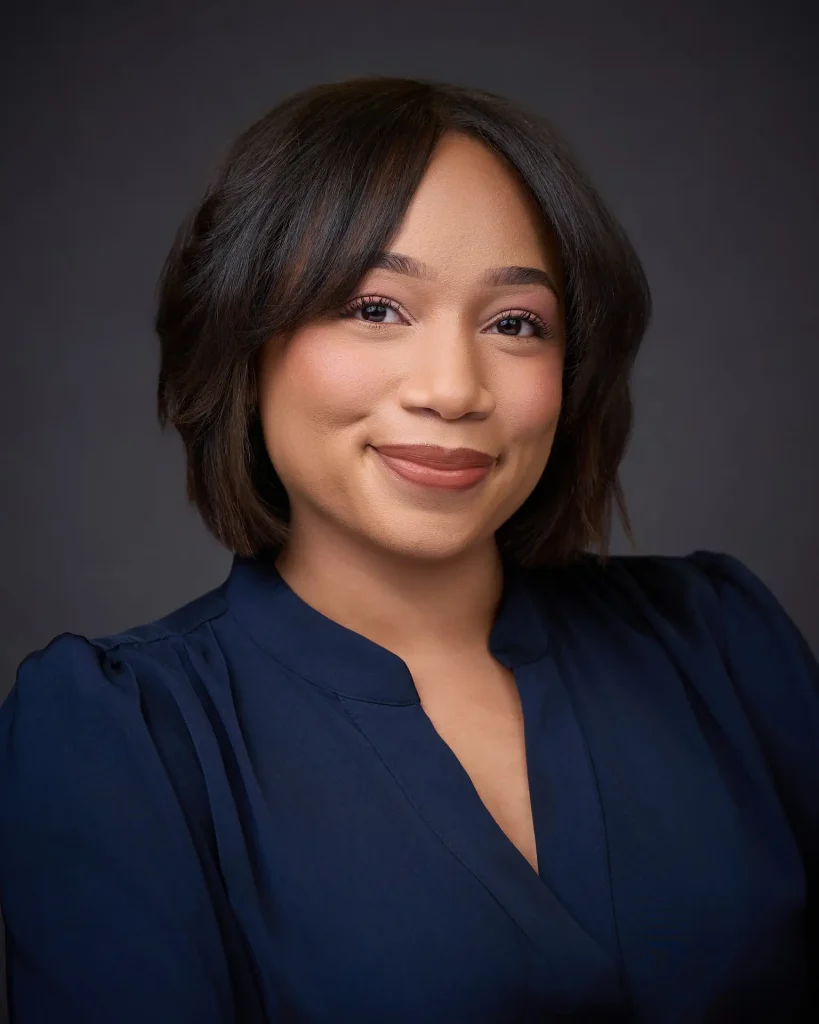 Professional onsite corporate headshot on a studio background